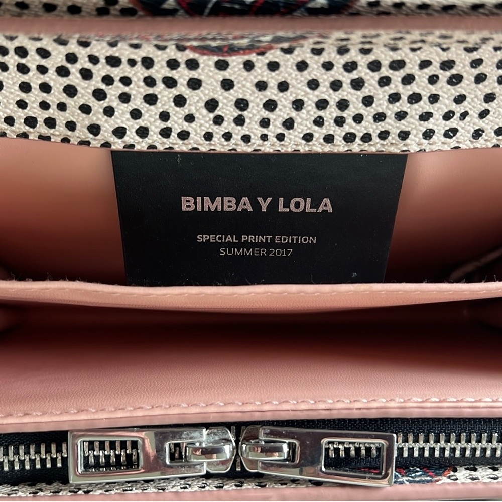 Bimba y Lola pebbled leather multi color shoulder/crossbody bag.